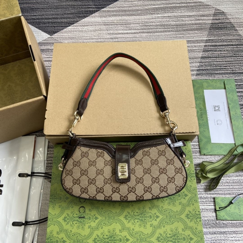 G*u*i top handle bags